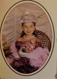 a photo of a girl in a victorian costume